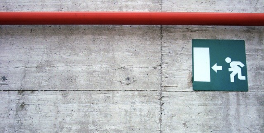 Emergency exit sign on a wall
