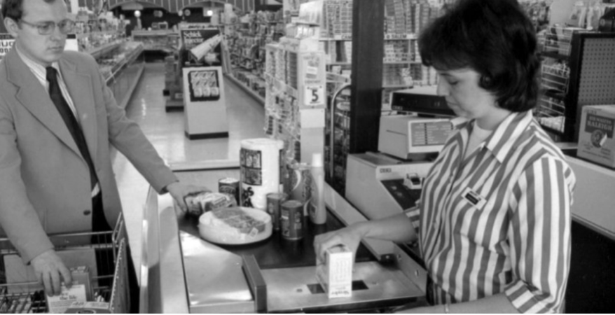 Cashier woman and client at a supermarket